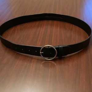 Large black belt, silver buckle.